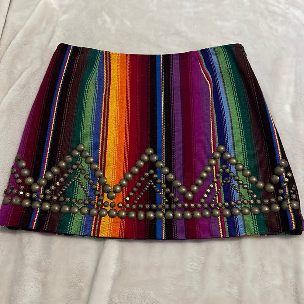 Serape embellished skirt with side zipper.